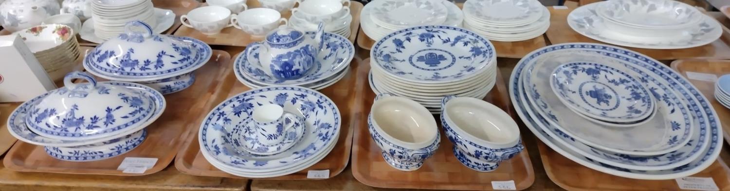 Four trays of blue and white Mintons 'Delft' pattern dinnerware, to include: oval meat plates,