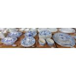 Four trays of blue and white Mintons 'Delft' pattern dinnerware, to include: oval meat plates,