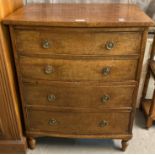 19th century oak bow front chest of four drawers on baluster turned legs. 64x45x82cm approx. (B.P.