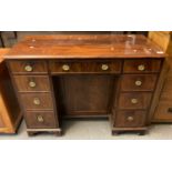 18th century style mahogany desk, the moulded top above a bank of four drawers to each pedestal with
