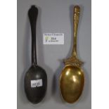 18th century pewter rat-tailed spoon and a probably continental brass armorial spoon. (2) (B.P.