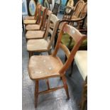 Set of six very similar beech and elm Windsor bar backed kitchen chairs with moulded solid seats and