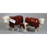 Three Beswick Hereford cattle figures; bull, cow and calf. (2) (B.P. 21% + VAT)