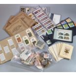 Collection of cigarette cards on pages and in small album together with military silks on cards, few