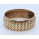 9ct gold bark finish wedding ring, size V, 5.6g approx. (B.P. 21% + VAT)