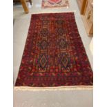 Hank knotted Zanjan style Persian runner on a red ground with geometric designs and lozenge