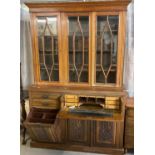 Late 19th century walnut two stage secretaire bookcase, the moulded cornice above three astragal