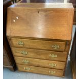 20th Century pale oak fall front bureau, having four long drawers. (B.P. 21% + VAT)