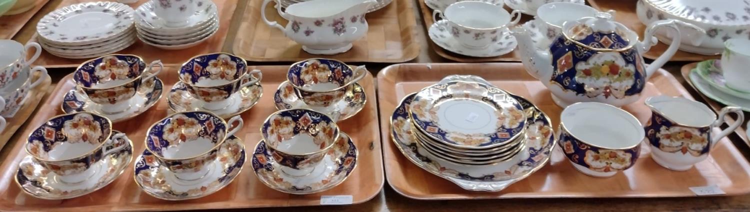 Two trays of Royal Albert English bone china 'Heirloom' design teaware to include: six teacups and