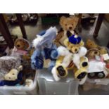 Three boxes of cuddly toys and teddy bears: Gund teddy bear with original label, musical Gund Winnie