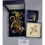 18ct gold cross, a 9ct gold necklace and assorted other yellow metal jewellery. (B.P. 21% + VAT)