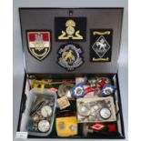 Box of assorted militaria items: pocket watches, penknives, gob watches, military blazer badges,