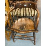 Early 20th century bentwood spindle back smoker's bow chair with pierced seat. (B.P. 21% + VAT)