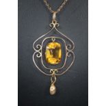 9ct gold Edwardian Art Nouveau design citrine set openwork pendant and chain. 4.1g approx. (B.P. 21%