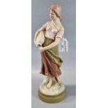 Small Royal Dux Bohemia figure of a girl, a water carrier. Puce triangle mark and impressed and