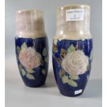 Pair of late 19th century Royal Doulton stoneware baluster vases overall on a blue ground with