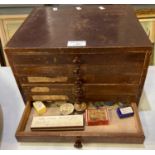 Early 20th century stained six drawer collector's cabinet, the interior revealing assorted watch