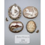 A shell cameo brooch mounted in 9ct gold. Together with two more shell cameo brooches and another