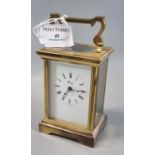 Brass carriage clock with full depth Roman face marked 'Henley'. 13.5cm high approx. (B.P. 21% +