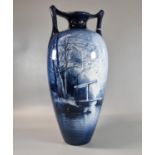 Art Nouveau design ceramic blue and white two handled overall vase with a lake scene, boats and