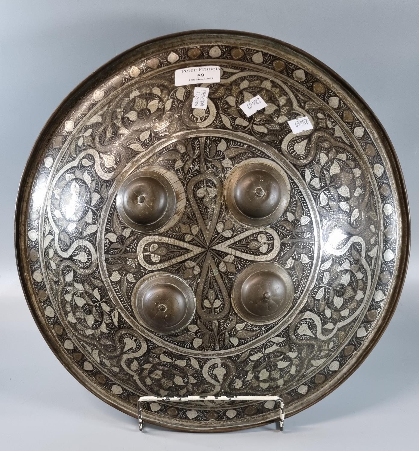 North Indian Damascened brass targe/shield with four bullseye mounts and foliate decoration. (B.P.