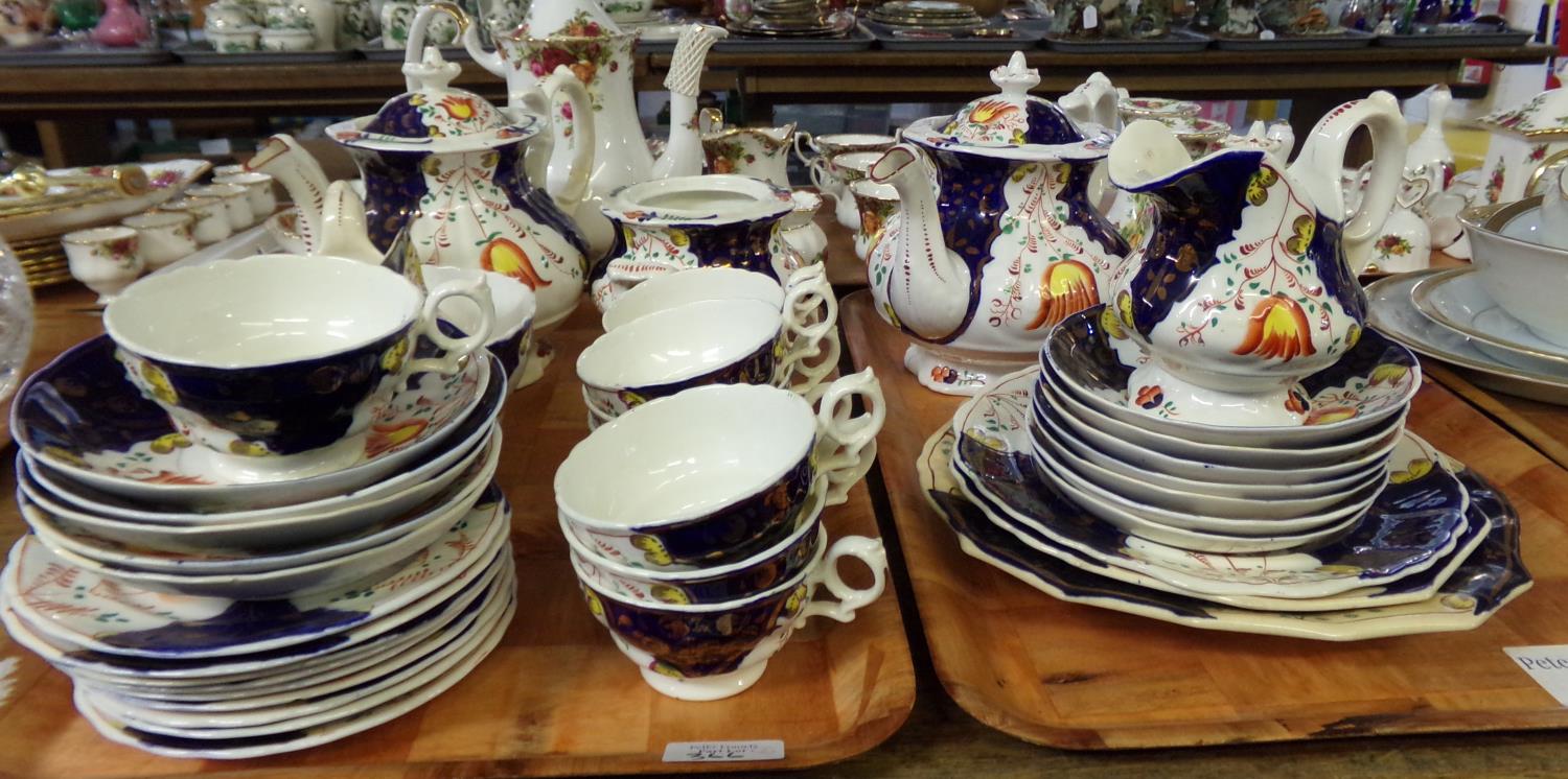 Two trays of 19th century Gaudy Welsh 'Tulip' design tea ware: two large teapots, two sucrieres, one