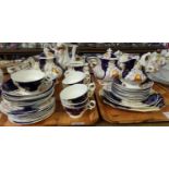 Two trays of 19th century Gaudy Welsh 'Tulip' design tea ware: two large teapots, two sucrieres, one