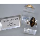 A yellow metal diamond set ring. Together with a silver and Tigers Eye ring. Approx weight 4.9