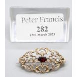 A 9ct gold gemset brooch. Approx weight 3.9 grams. (B.P. 21% + VAT)