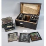 Collection of Victorian magic lantern glass slides featuring little black boys with rhymes, other