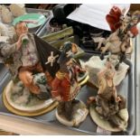 Collection of Capodimonte figurines, to include: 'The Pirate King', tramp on a bench, 'Napoleon' and