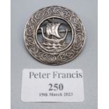 A Scottish silver brooch depicting a Viking ship. (B.P. 21% + VAT)