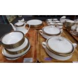 Four trays of Royal Albert 'Clarence' tea and dinner ware: six place settings of dinner plates, side