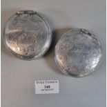 Two tin vintage snuff boxes of circular form. one marked Llanelly, the other marked Tonypandy. (