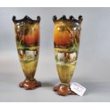 Pair of Royal Doulton vases of ovoid form of cattle in a field, signed H Morrey. 20cm high