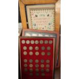 Two cased montages of clay pipes together with a collection of one penny coins framed and a framed