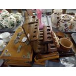 Tray with smoking paraphernalia: two wooden pipe racks, two wooden pipe stands and a glass pipe