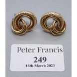 A pair of 9ct gold knot earrings. Approx weight 4.1 grams. (B.P. 21% + VAT)