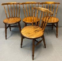 Set of four early 20th century beech stained Windsor penny kitchen chairs, having circular moulded