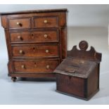 19th century oak miniature apprentice bow front chest of drawers, the moulded top above an