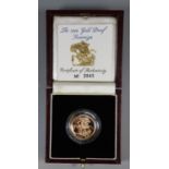 The 1994 gold proof sovereign by the Royal Mint with COA no. 2843, in original box and plastic