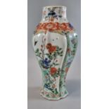 Chinese porcelain famille Verte quarter lobed flattened baluster vase, overall decorated with panels
