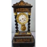 Early 19th century French marquetry inlaid eight day Portico clock with white enamel Roman face