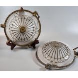 A collection of four similar Art Deco design probably French frosted glass ceiling light shades with