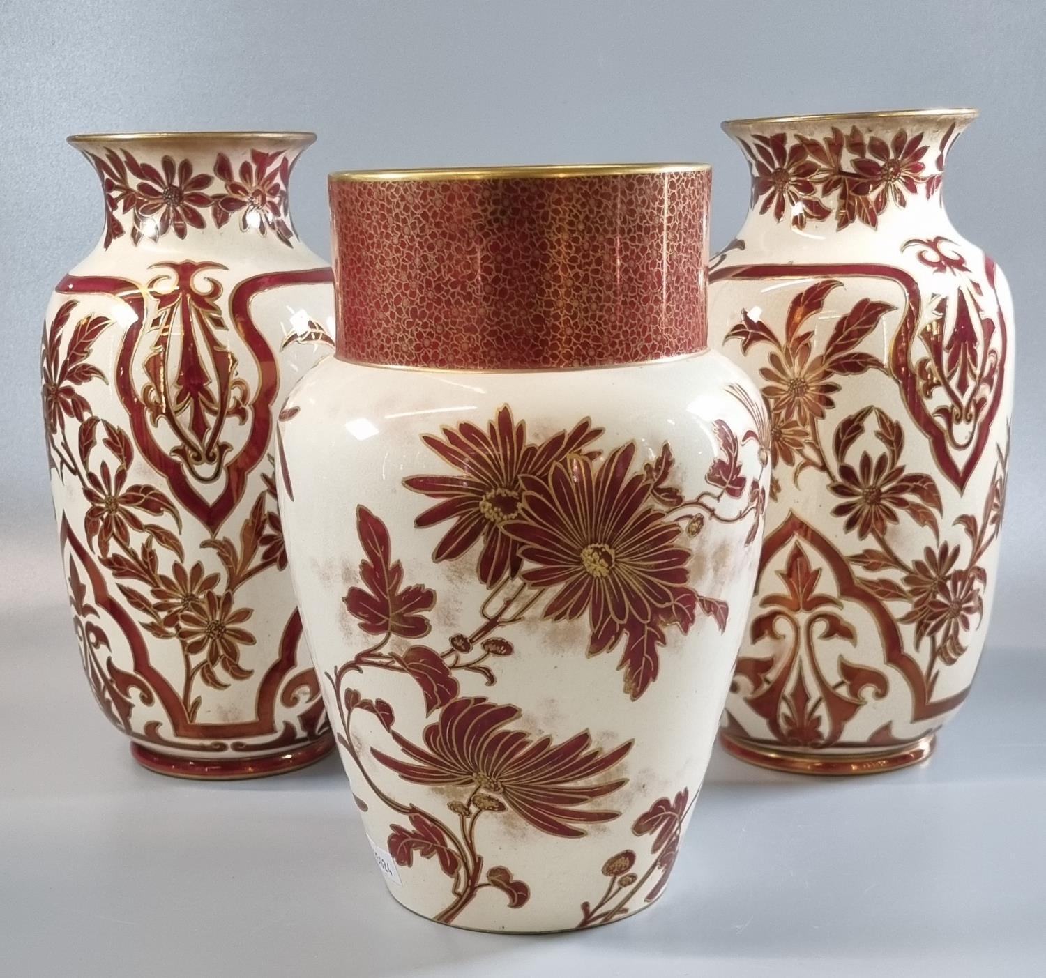 Pair of late 19th early 20th century Doulton Burslem Art Ware vases of baluster form on a cream