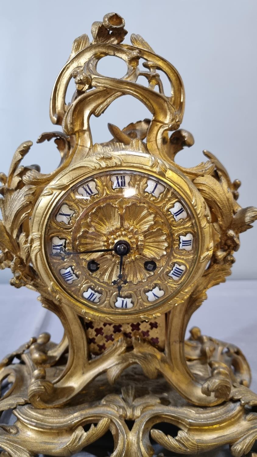 Late 19th century French ormolu rococo style balloon shaped mantle clock, overall decorated with - Image 2 of 2