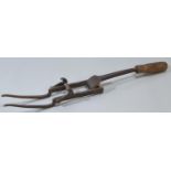 Unusual 19th century steel cross bow crank or 'goat's foot' lever with turned fruitwood handle. 63cm