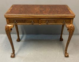 Georgian style walnut fold over card table, the moulded top with hinged lid and green baize above