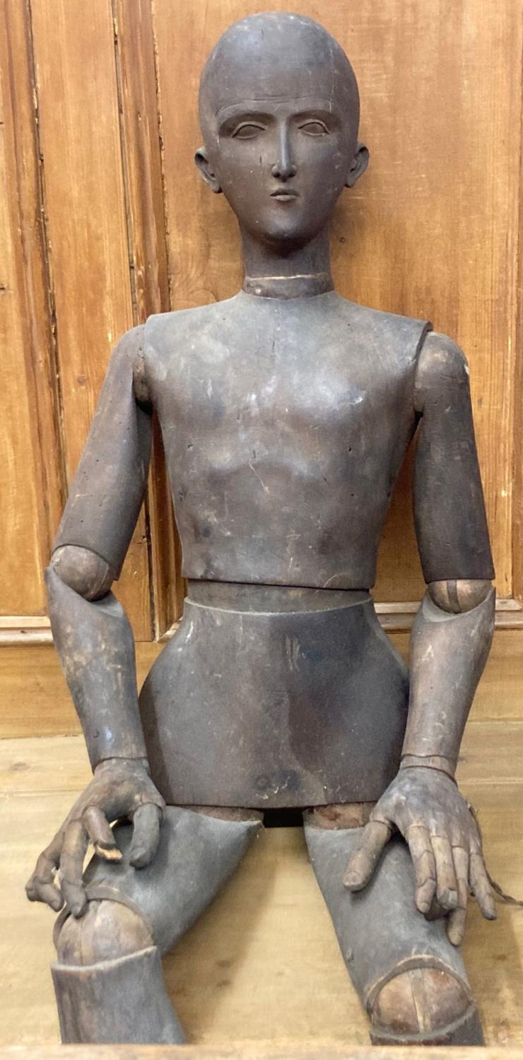 19th century Lay figure/artists wooden mannequin with moveable limbs and articulated fingers.