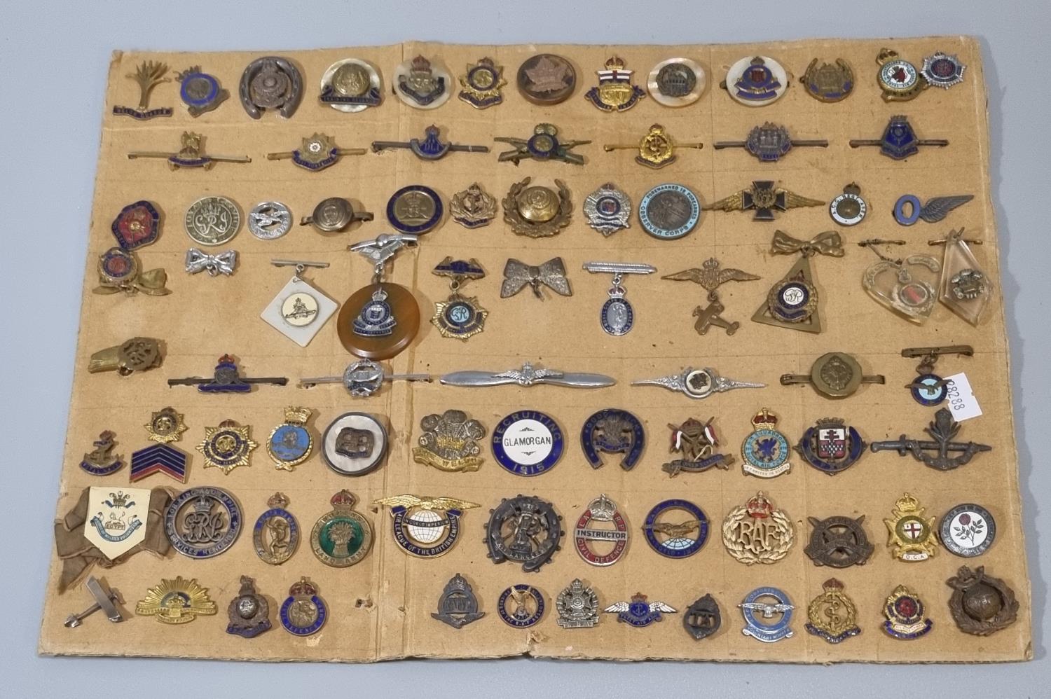 Large collection of British military sweetheart brooches of different forms: WWI and WWII, 95